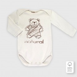 Newborn´s one-piece with pinned collar in organic cotton.